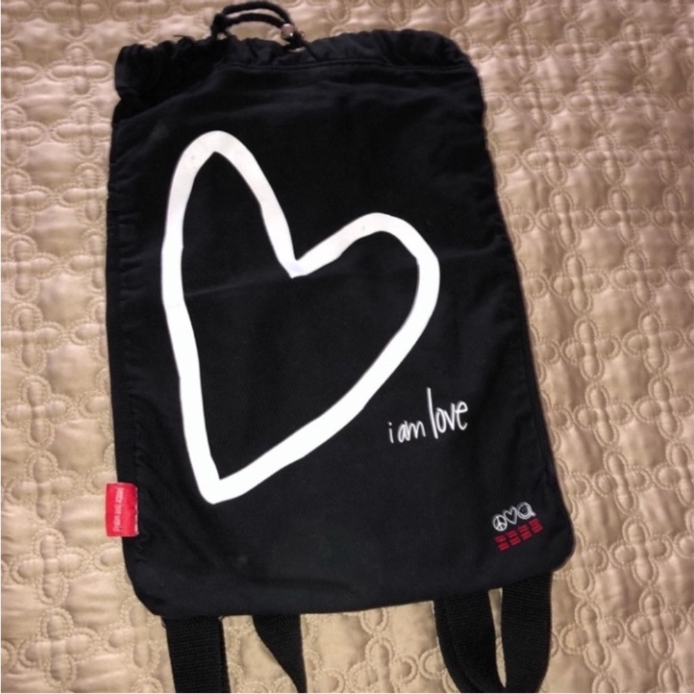 Peace Love World Black Backpack with White Heart